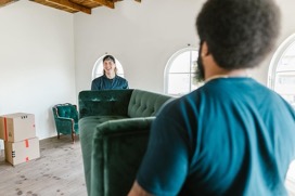 Hiring movers when moving houses.