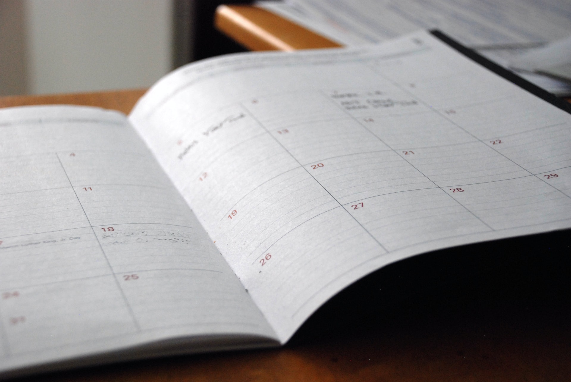 An opened schedule notebook.