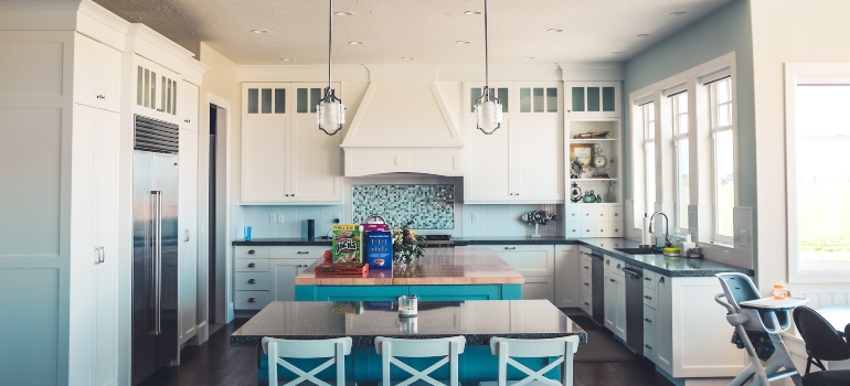 Blue and white kitchen interior.