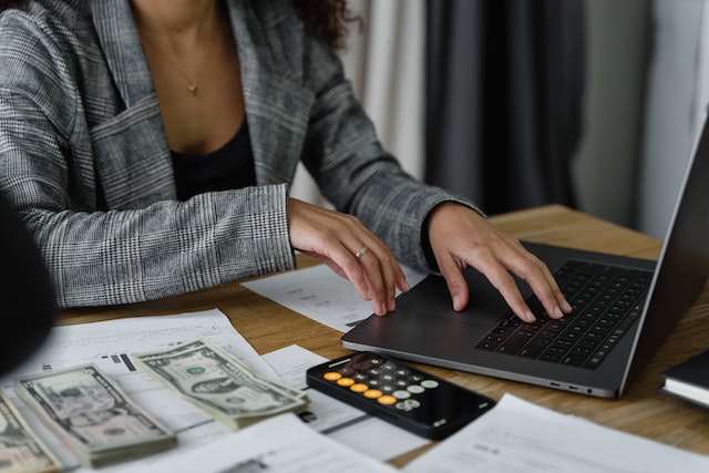 A woman paying bills