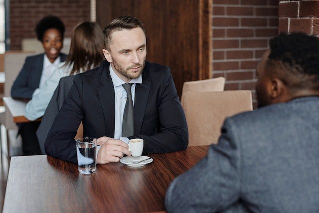 Two men talking