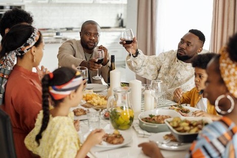 A big family sitting at a table