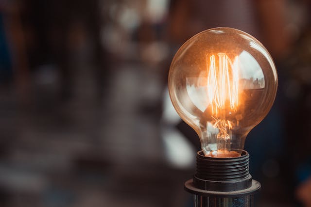 A lit light bulb.